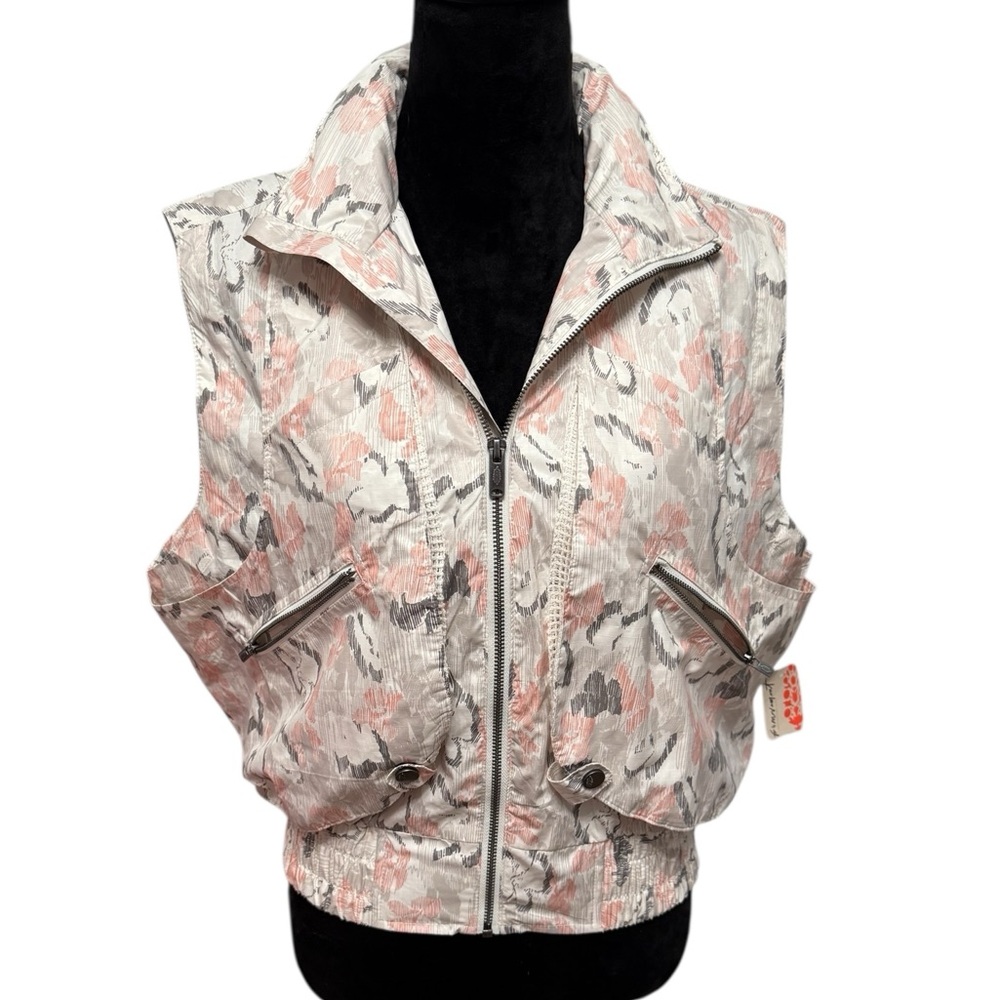 NWT Free People Movement Off The Grid Vest in Ivory Floral.